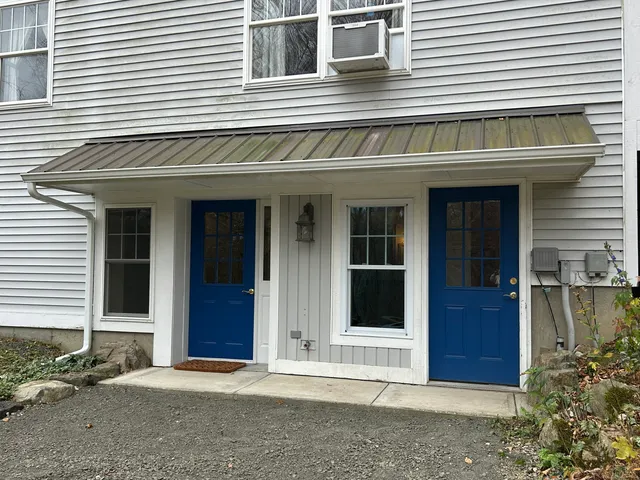 a view of a house with entrance and porch