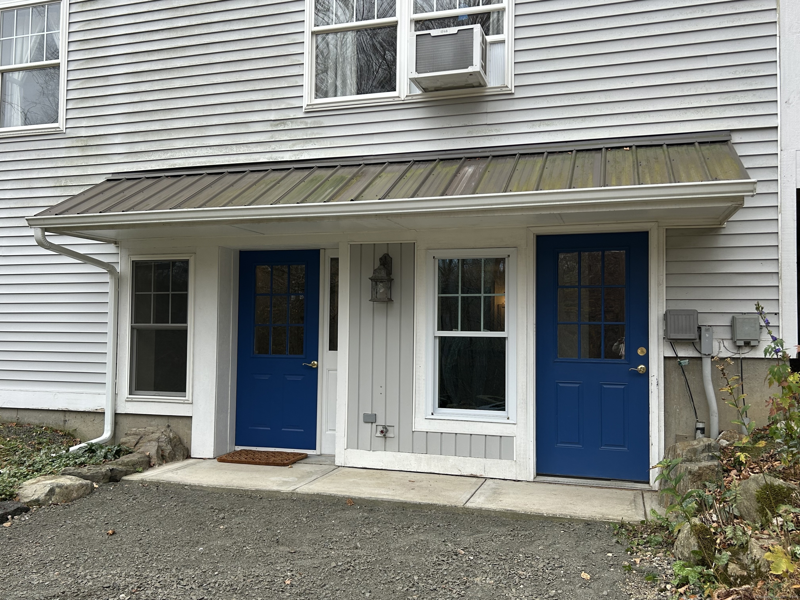 199 Hoop Pole Hill Road Woodbury, CT 06798 - Photo 3 of 15 a view of a house with entrance and porch