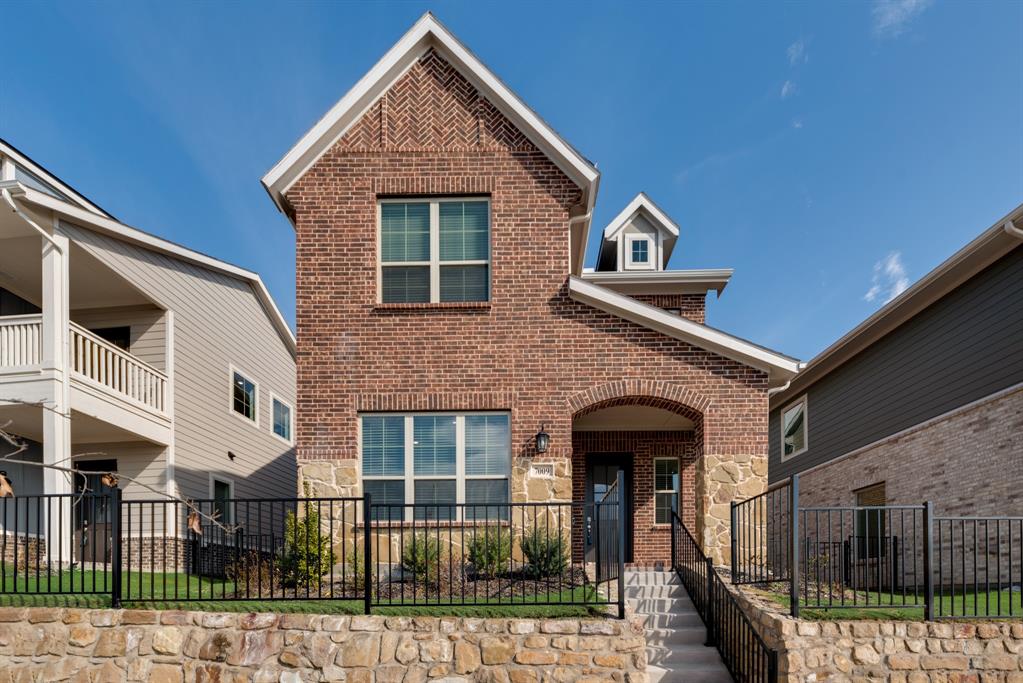 7009 Sunset Boulevard Rowlett, TX 75088 - Photo 1 of 35 a front view of a house with glass windows