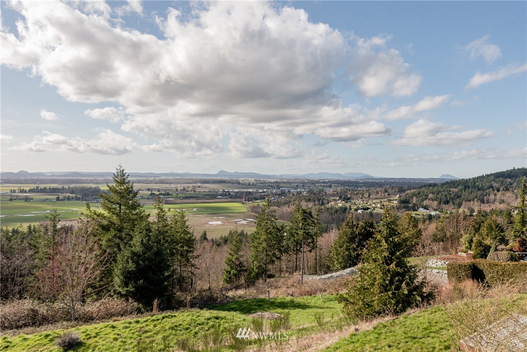 18564 Cascade View Drive Mount Vernon, WA 98274 - Photo 37 of 40 a view of a lake from a yard