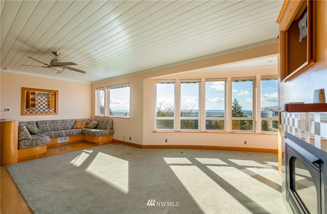 18564 Cascade View Drive Mount Vernon, WA 98274 - Photo 9 of 40 a living room with furniture and a large window