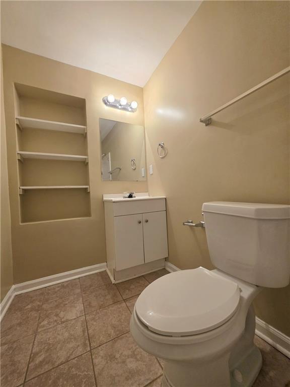 186 South Red Oak Way Temple, GA 30179 - Photo 16 of 19 a bathroom with a toilet and a sink