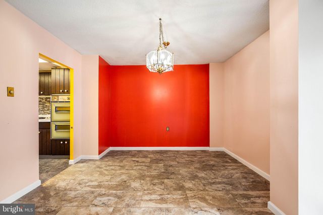 a balcony with trees in the background
