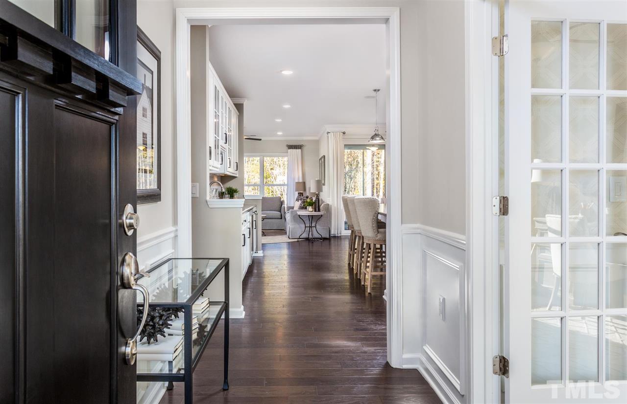 704 Haven Peak Lane Wake Forest, NC 27587 - Photo 2 of 28 a view of a dining room with furniture