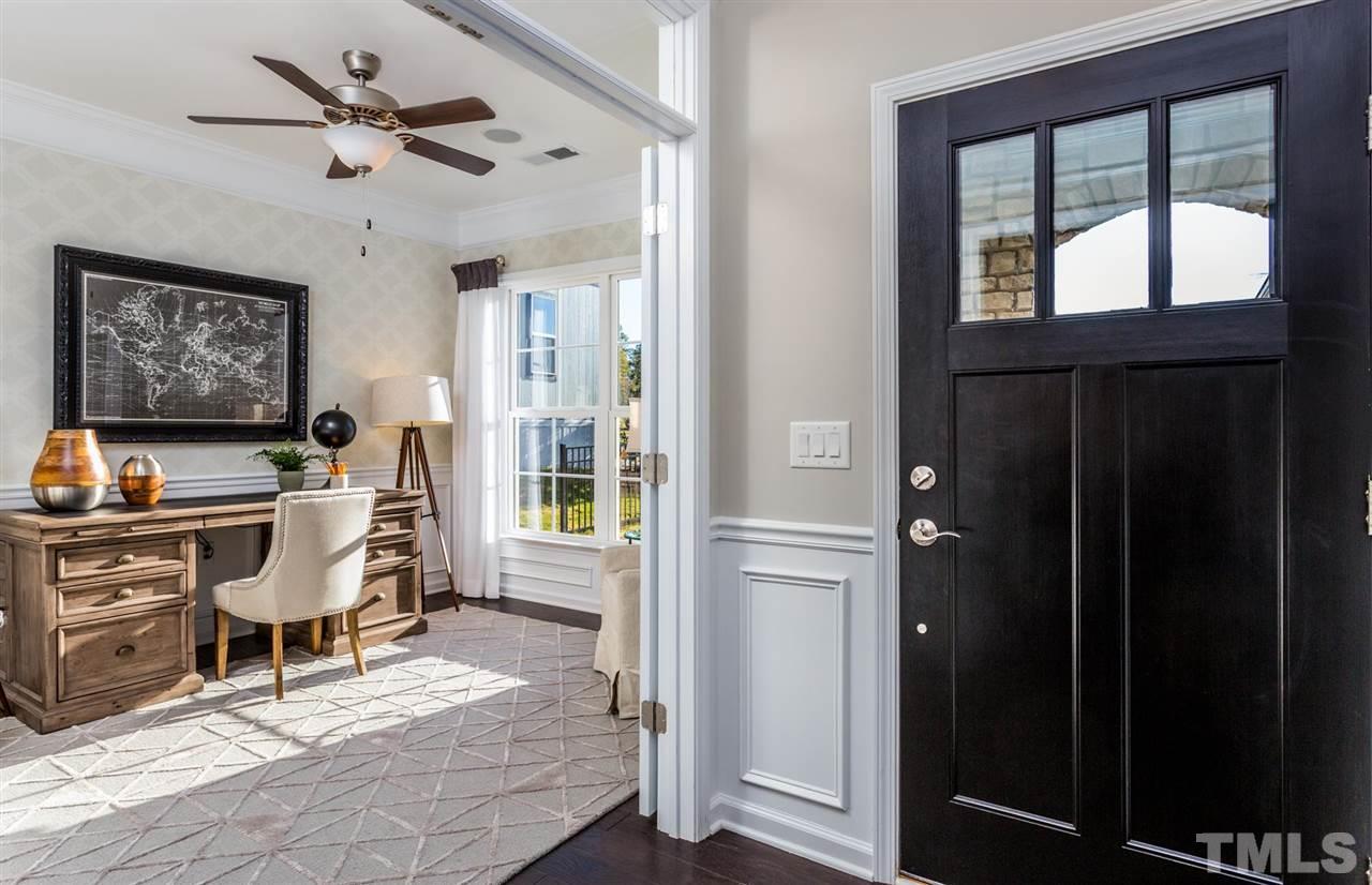 704 Haven Peak Lane Wake Forest, NC 27587 - Photo 3 of 28 a work room with furniture and a window
