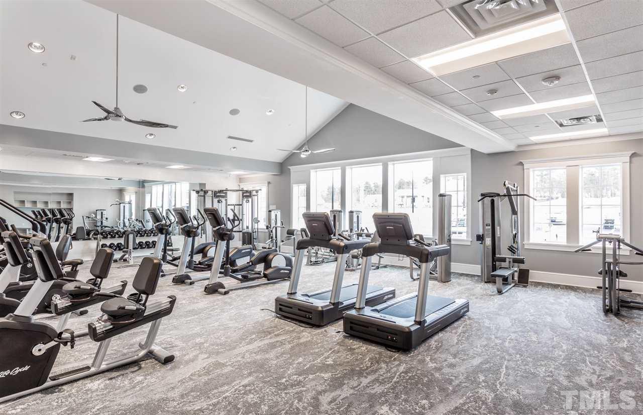 704 Haven Peak Lane Wake Forest, NC 27587 - Photo 24 of 28 a view of a room with gym equipment