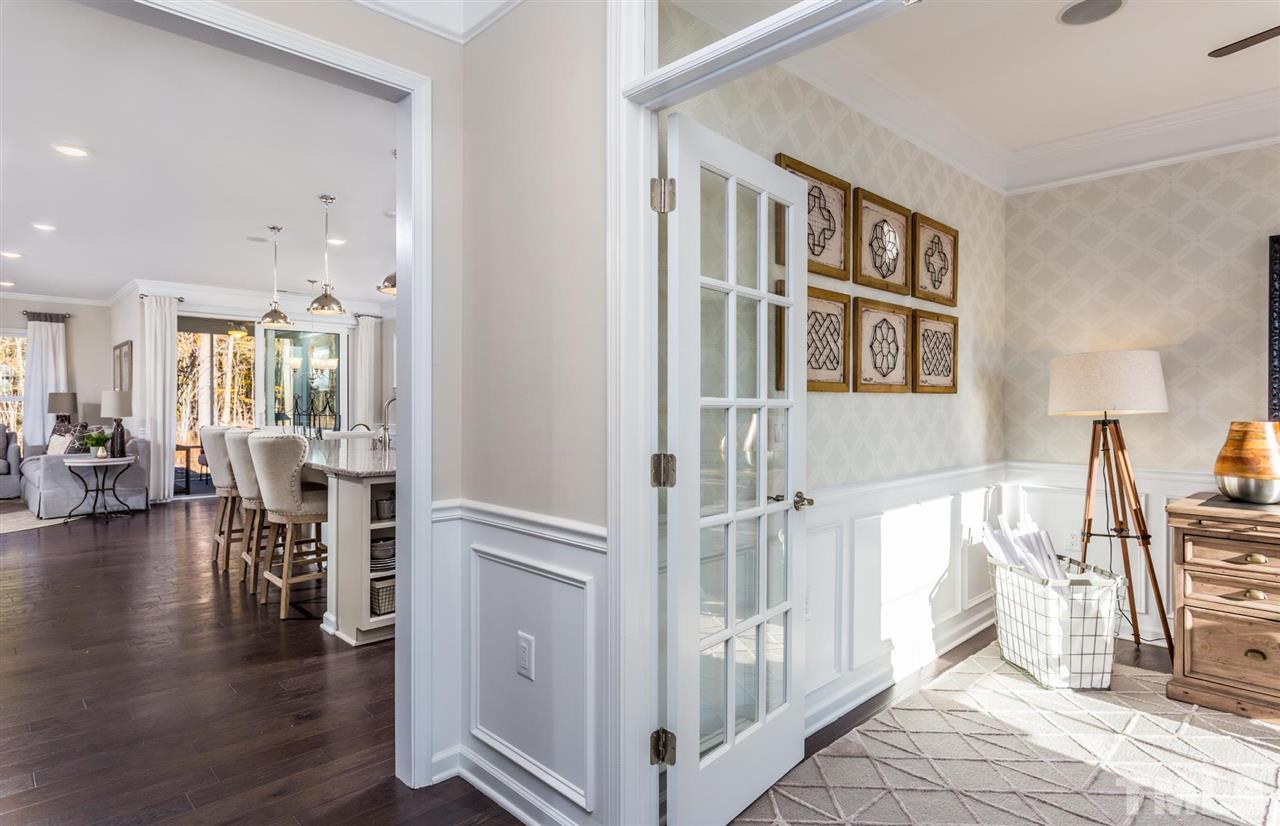 704 Haven Peak Lane Wake Forest, NC 27587 - Photo 4 of 28 a view of a livingroom with furniture and hardwood floor