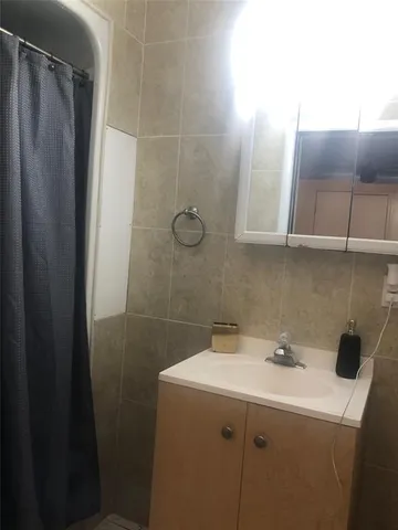 a view of a workspace with furniture