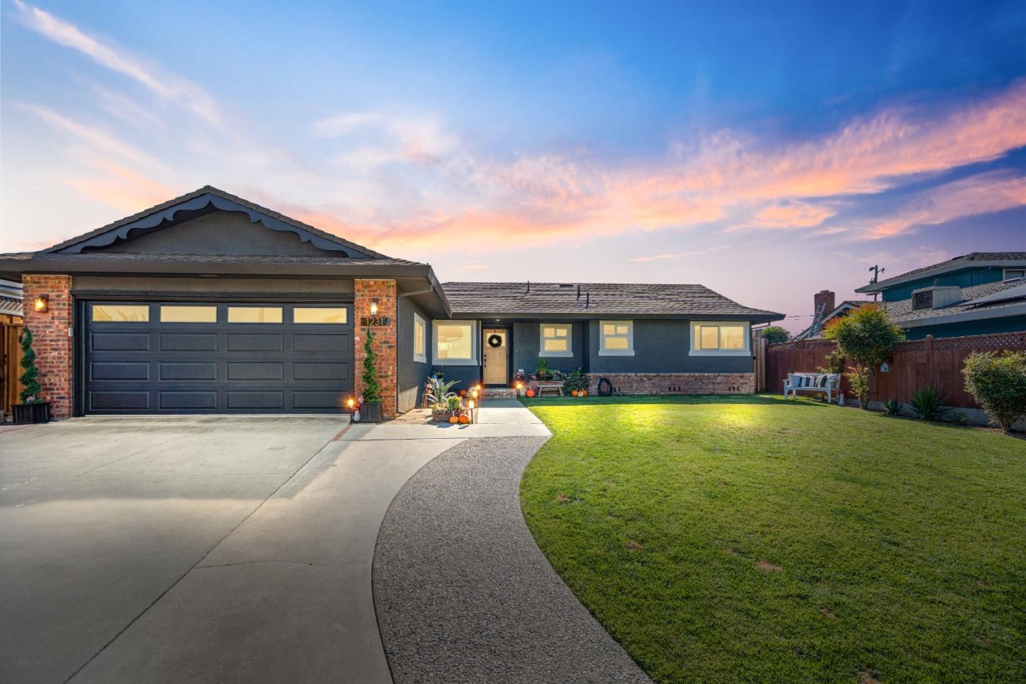 1231 Westward Drive Hollister, CA 95023 - Photo 1 of 68 a front view of a house with yard