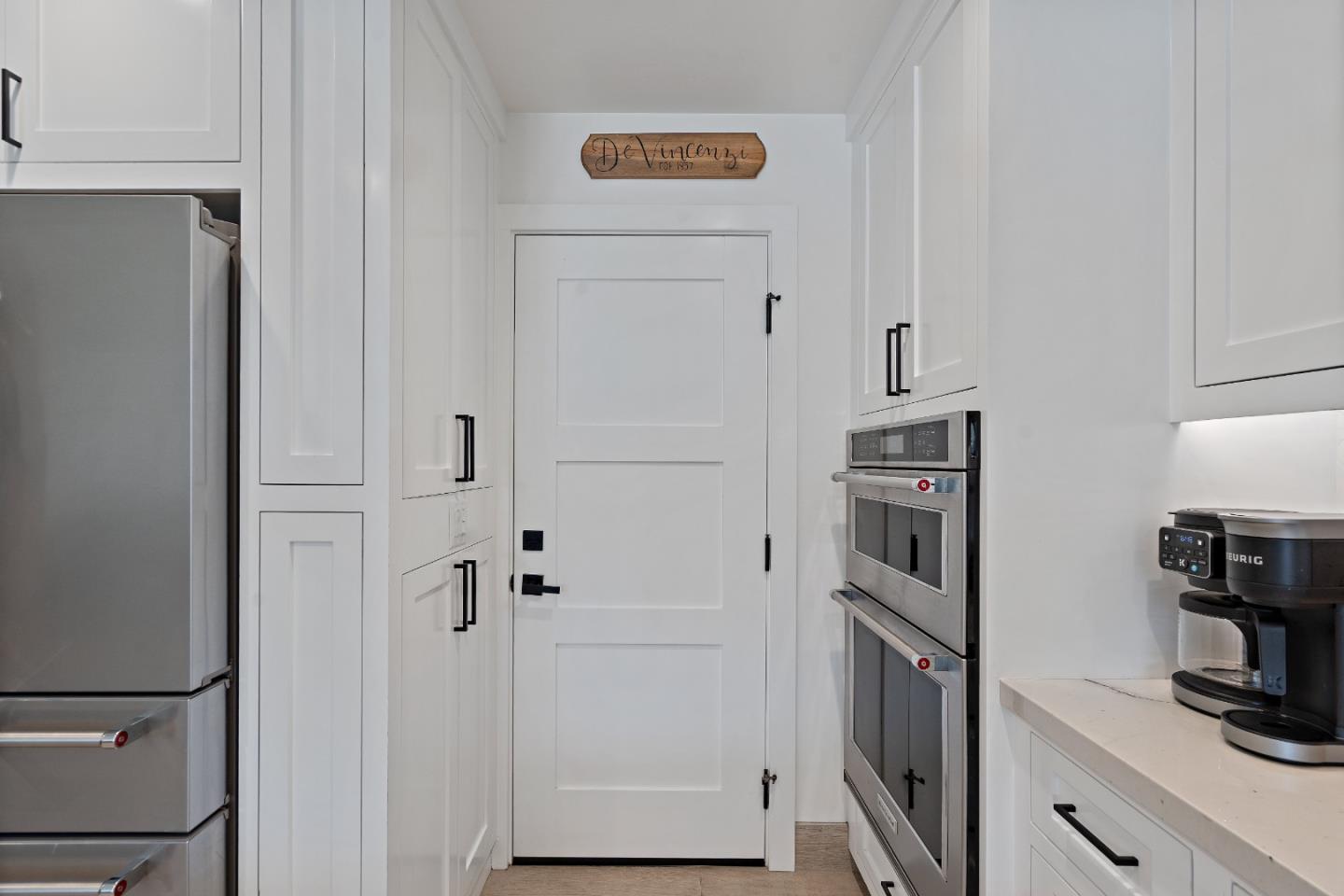 1231 Westward Drive Hollister, CA 95023 - Photo 15 of 68 a kitchen with cabinets and stainless steel appliances