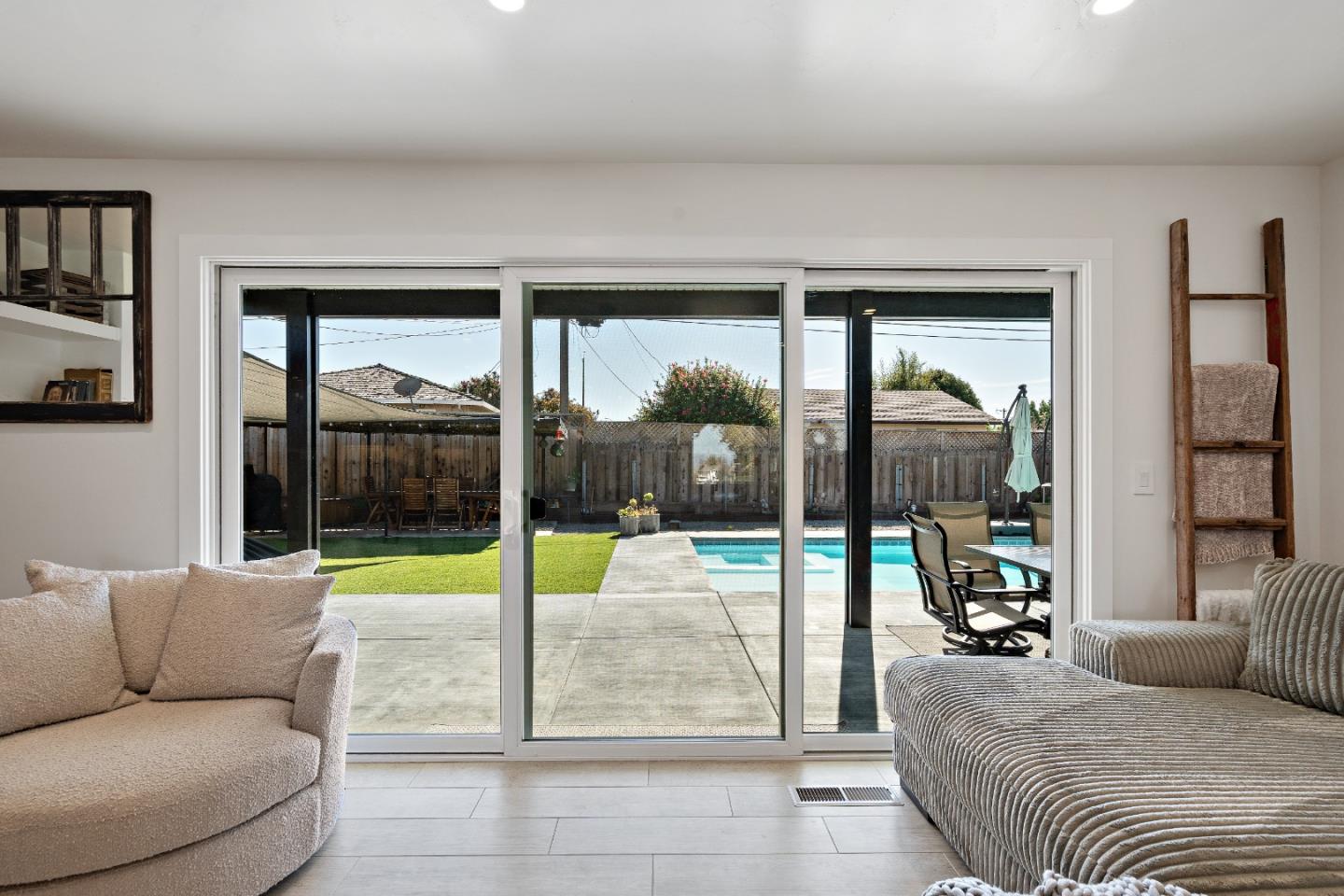 1231 Westward Drive Hollister, CA 95023 - Photo 25 of 68 a living room with furniture and a large window