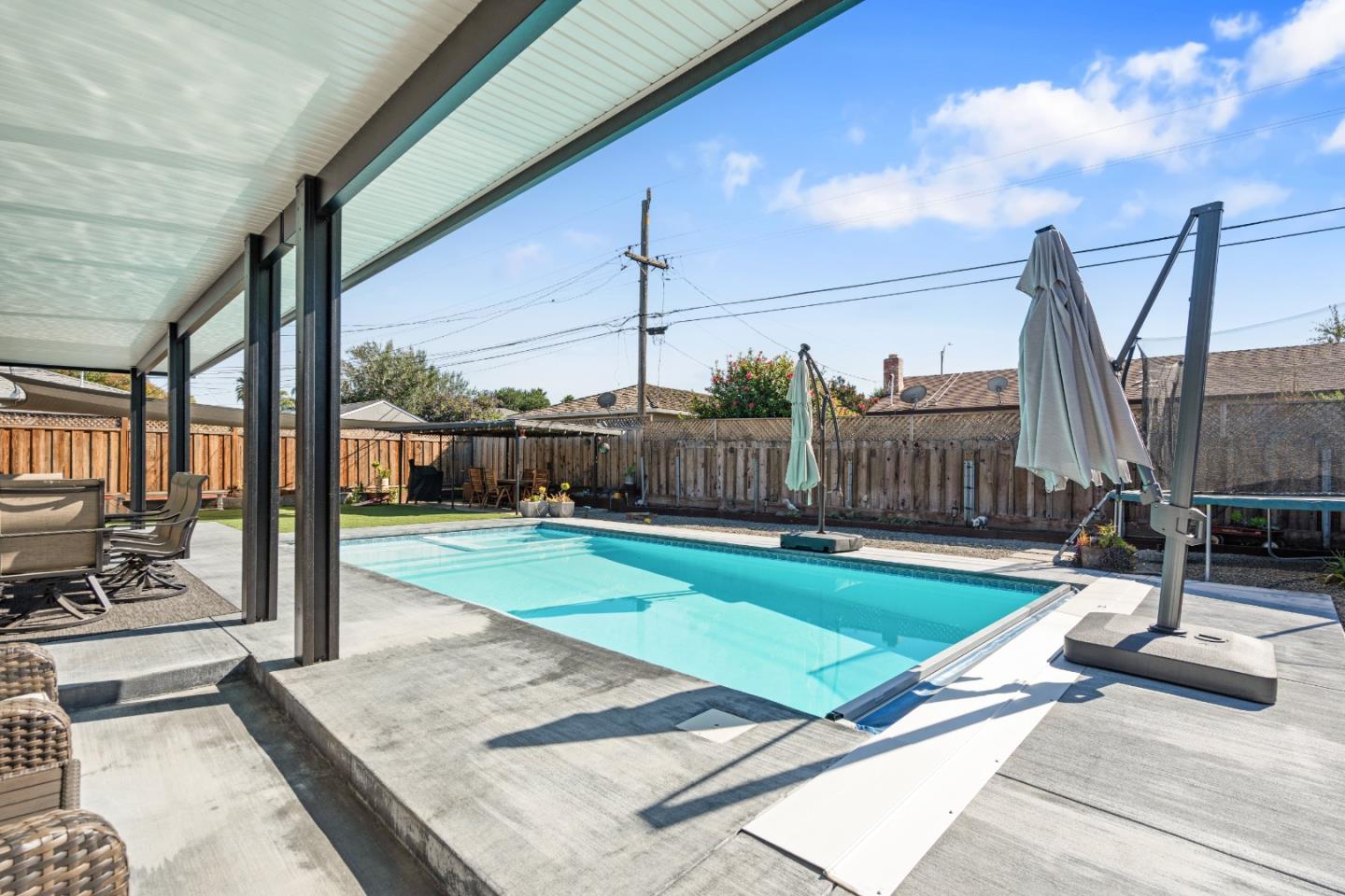 1231 Westward Drive Hollister, CA 95023 - Photo 41 of 68 a view of a patio with a table chairs and a patio