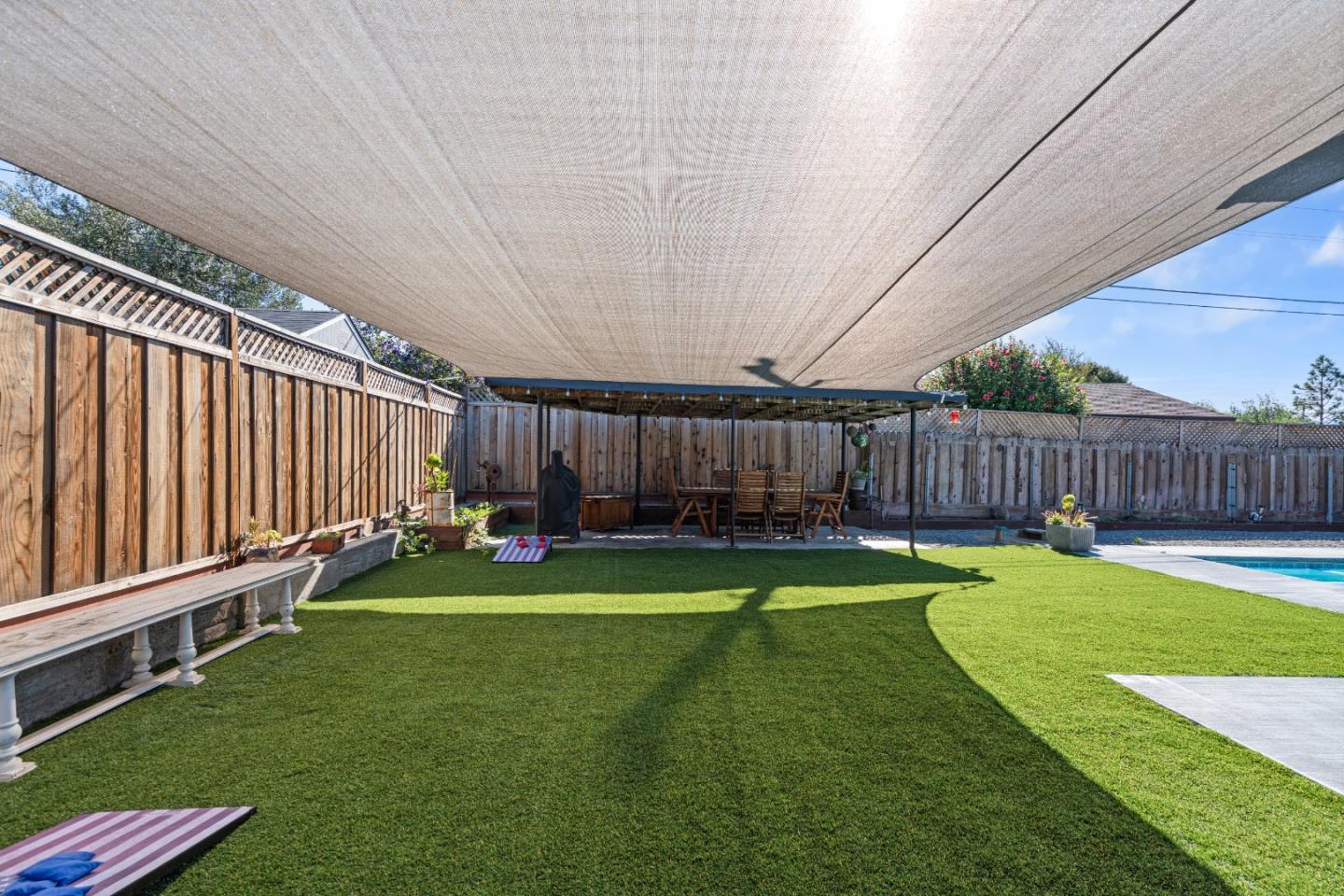 1231 Westward Drive Hollister, CA 95023 - Photo 49 of 68 a view of a backyard with wooden fence
