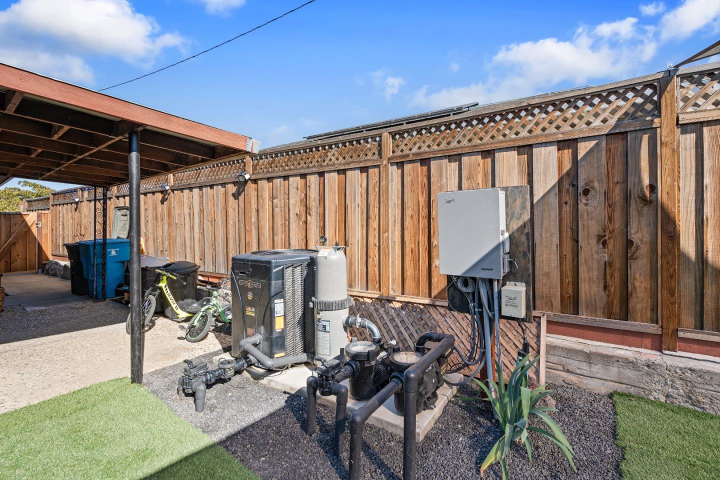 1231 Westward Drive Hollister, CA 95023 - Photo 50 of 68 a view of a patio with table and chairs with plants and wooden fence