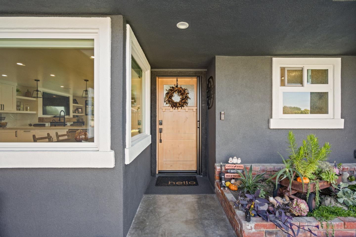 1231 Westward Drive Hollister, CA 95023 - Photo 7 of 68 a view of an entryway with a flower pot
