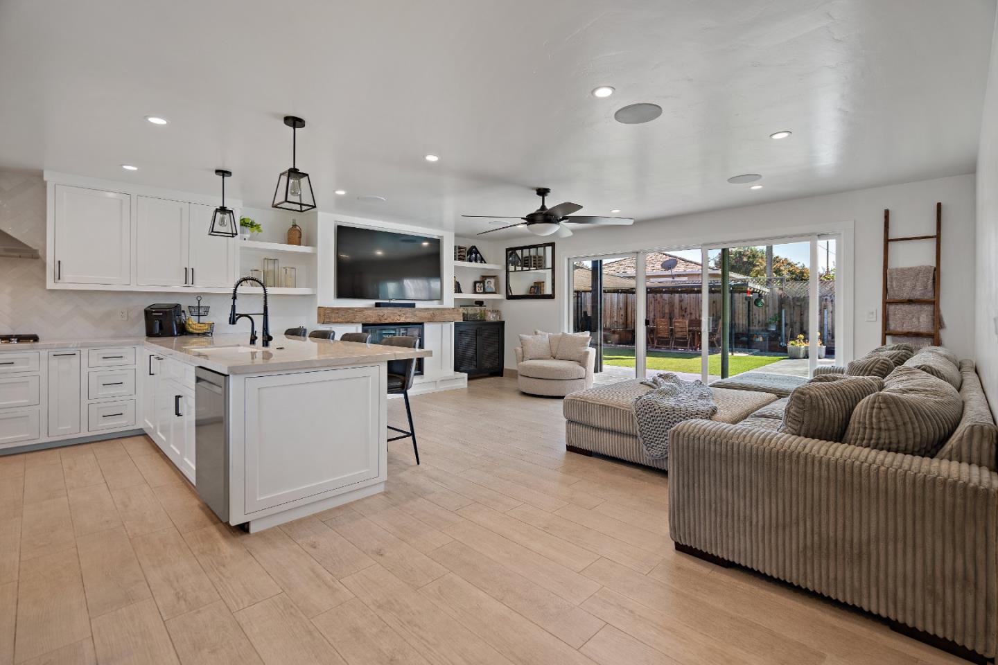 1231 Westward Drive Hollister, CA 95023 - Photo 8 of 68 a living room with furniture and a flat screen tv