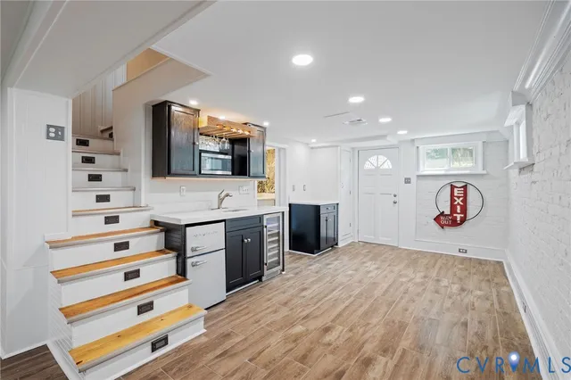 a spacious bathroom with a sink and a mirror