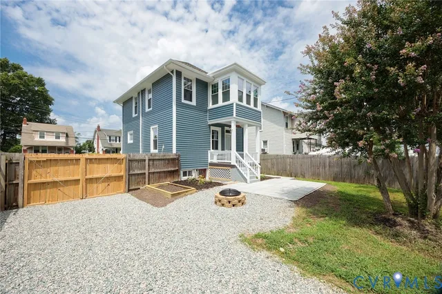 a house with porch and wooden floor