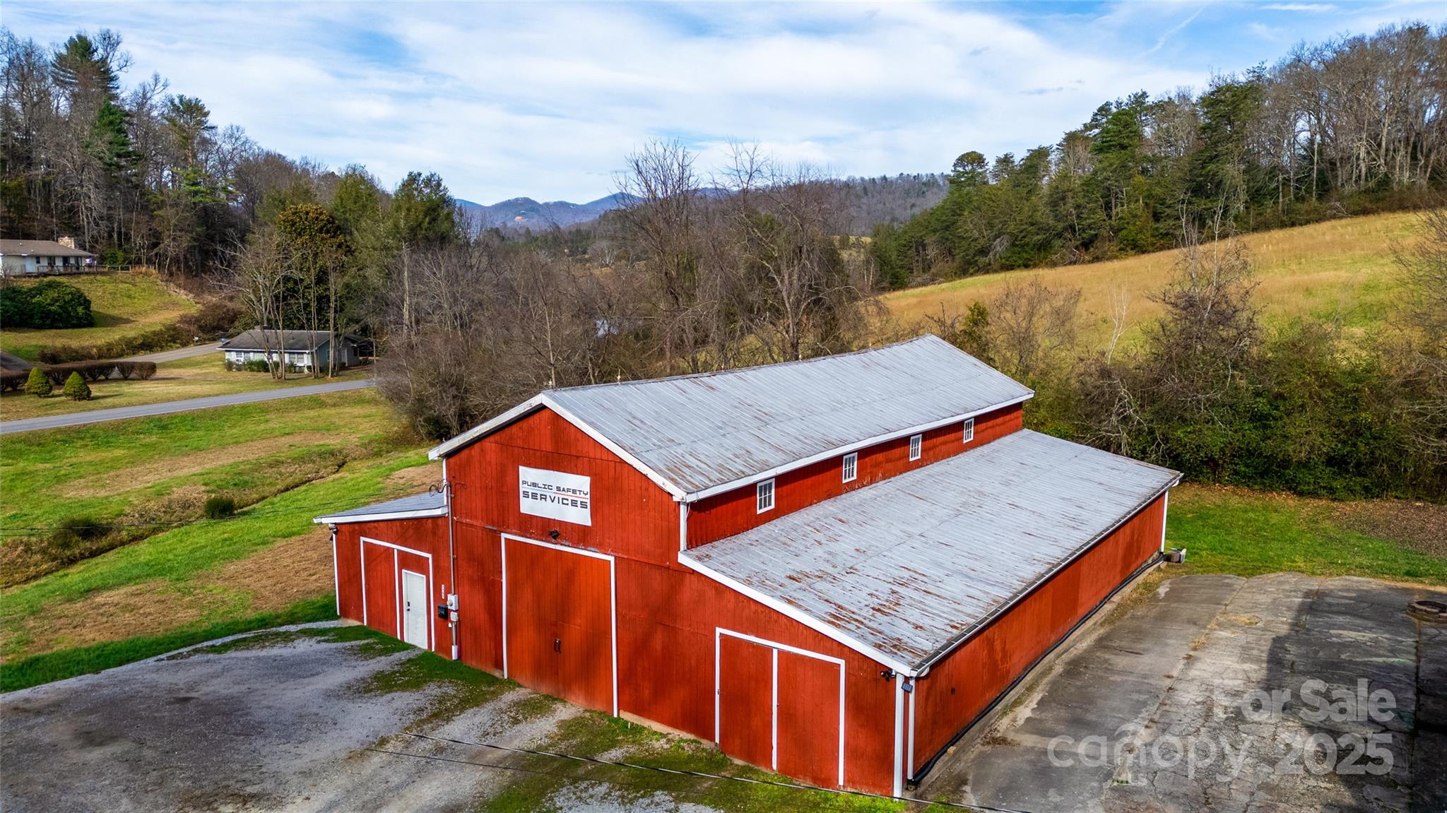 1137 Saunders Road Franklin, NC 28734 - Photo 2 of 30 an aerial view of houses and outdoor space