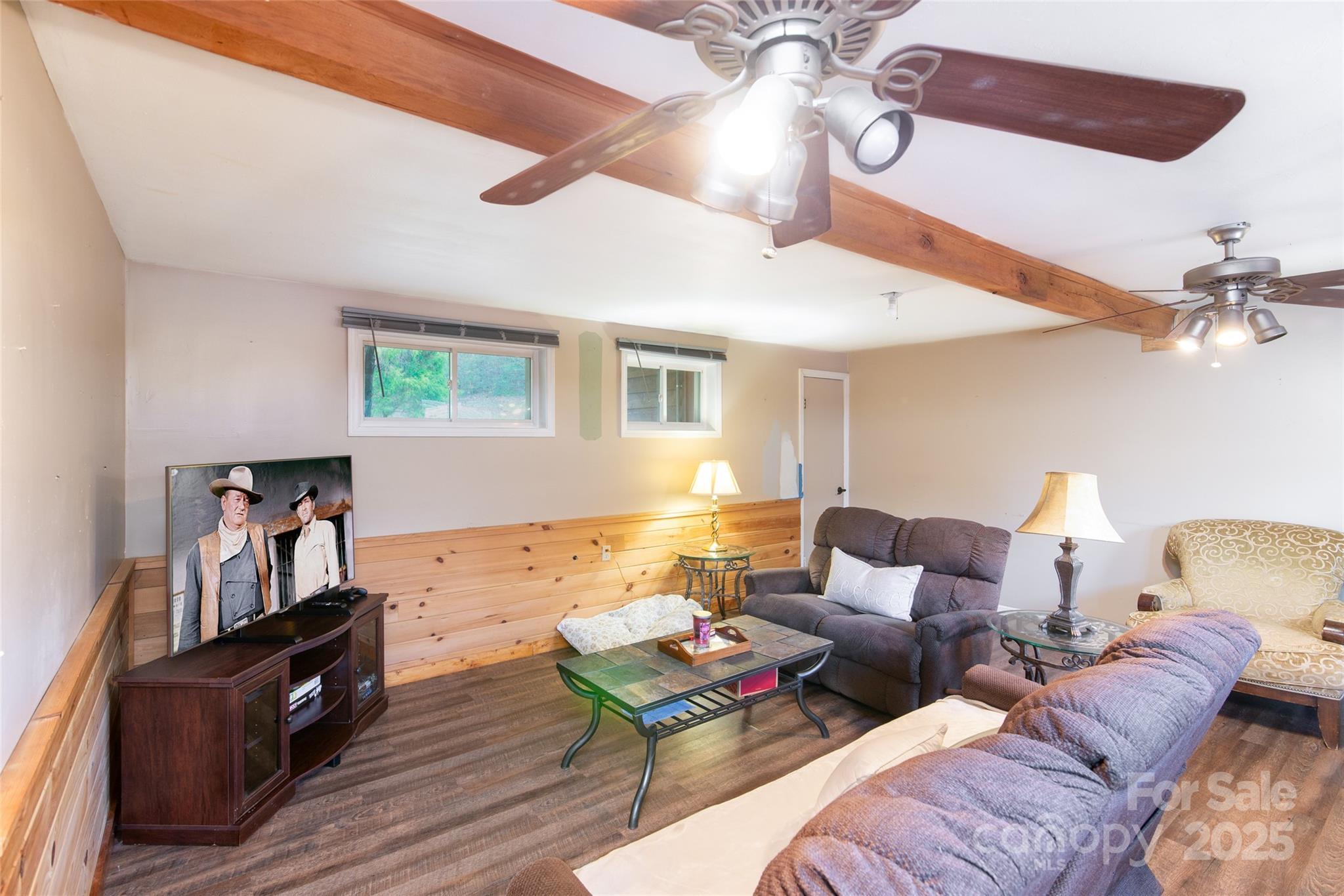 1137 Saunders Road Franklin, NC 28734 - Photo 30 of 30 a living room with furniture and wooden floor