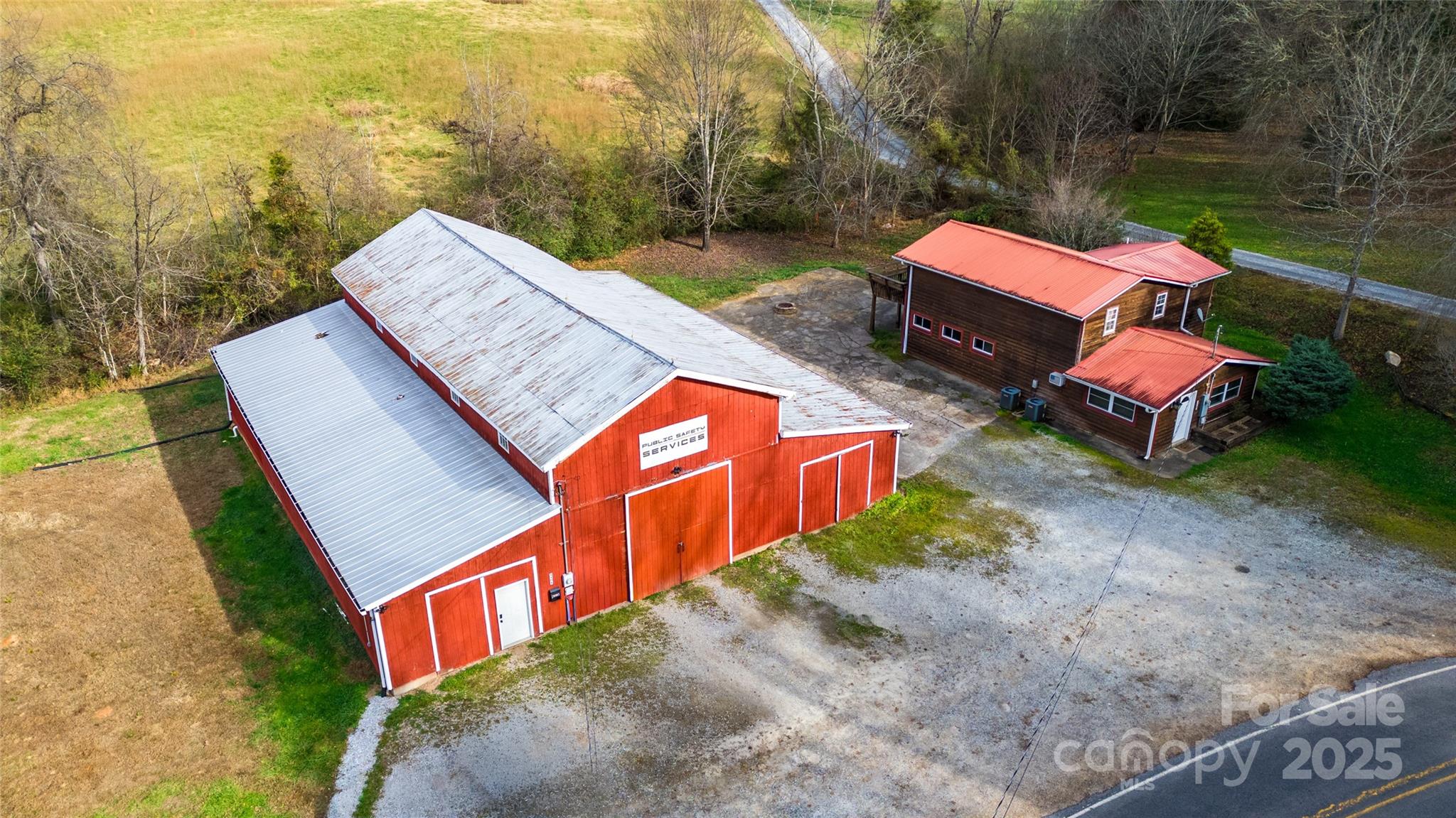 1137 Saunders Road Franklin, NC 28734 - Photo 3 of 30 a view of a two chairs in a backyard