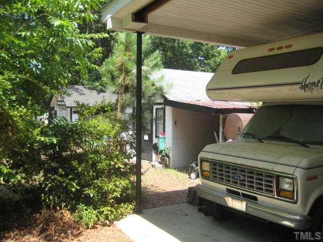 8621 Old Stage Road Raleigh, NC 27603 - Photo 23 of 25 RV carport, with all hook ups