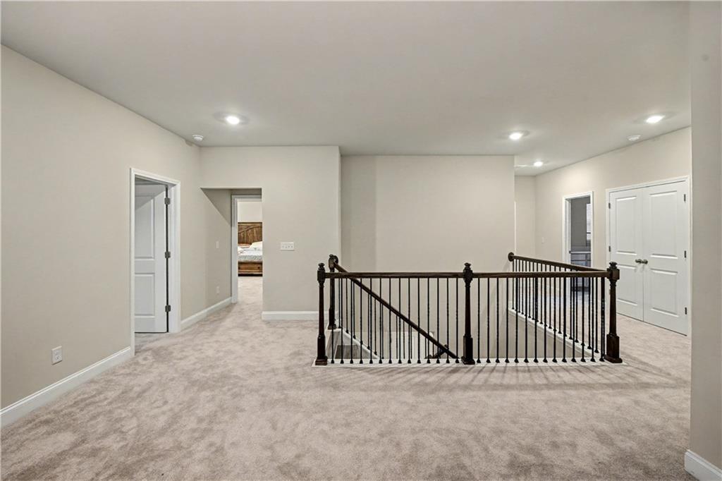 3068 Shirecrest Lane Dacula, GA 30019 - Photo 14 of 41 a view of a hallway with closet area