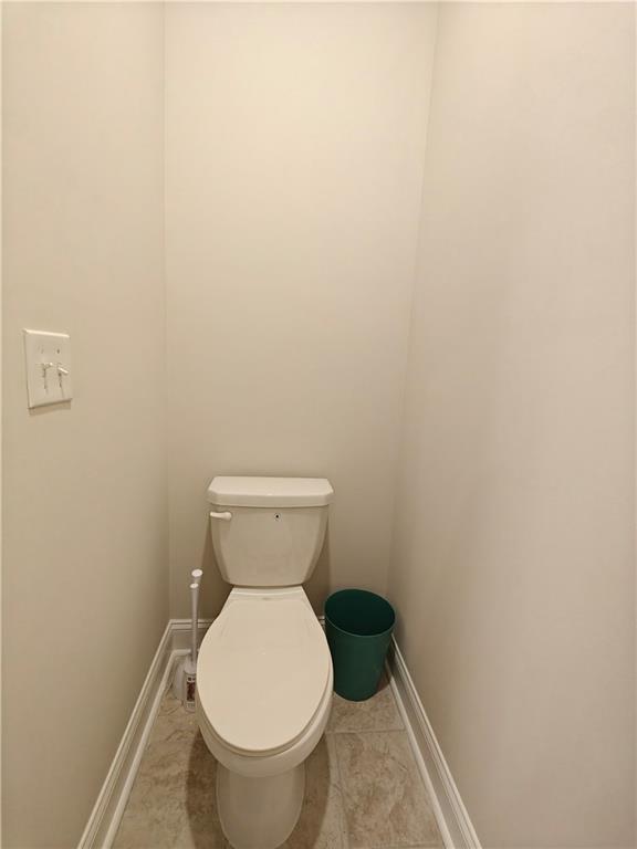 3068 Shirecrest Lane Dacula, GA 30019 - Photo 30 of 41 a white toilet sitting next to a white wall