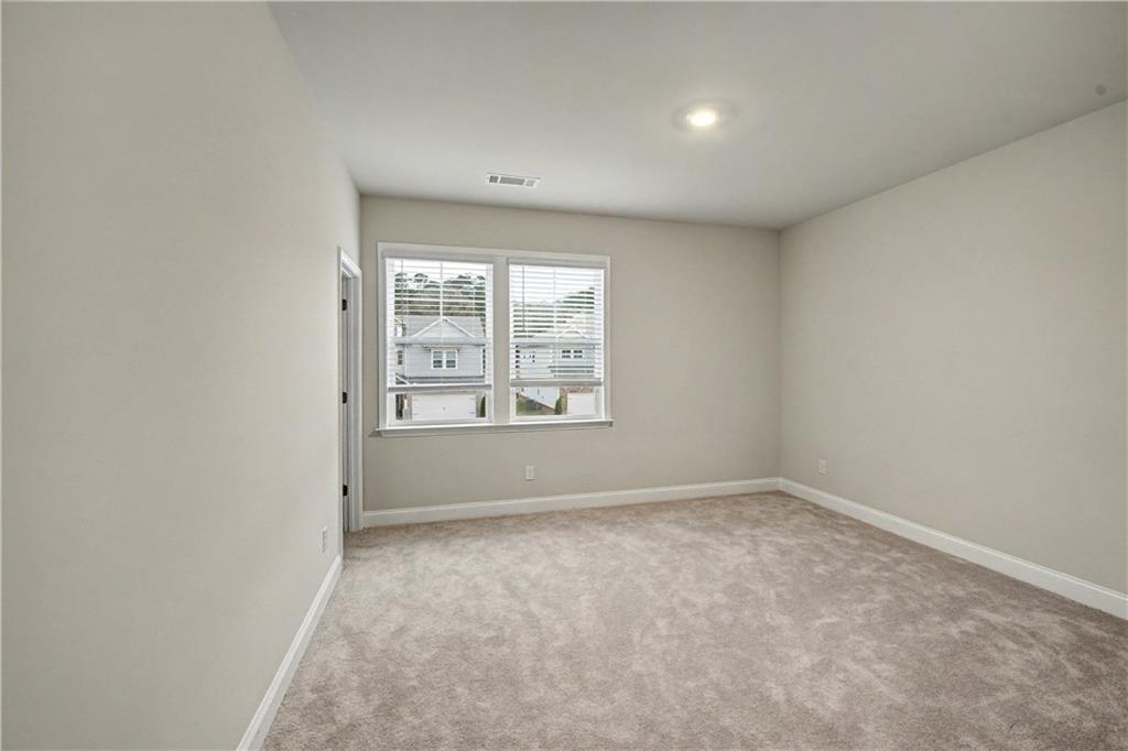 3068 Shirecrest Lane Dacula, GA 30019 - Photo 38 of 41 an empty room with windows
