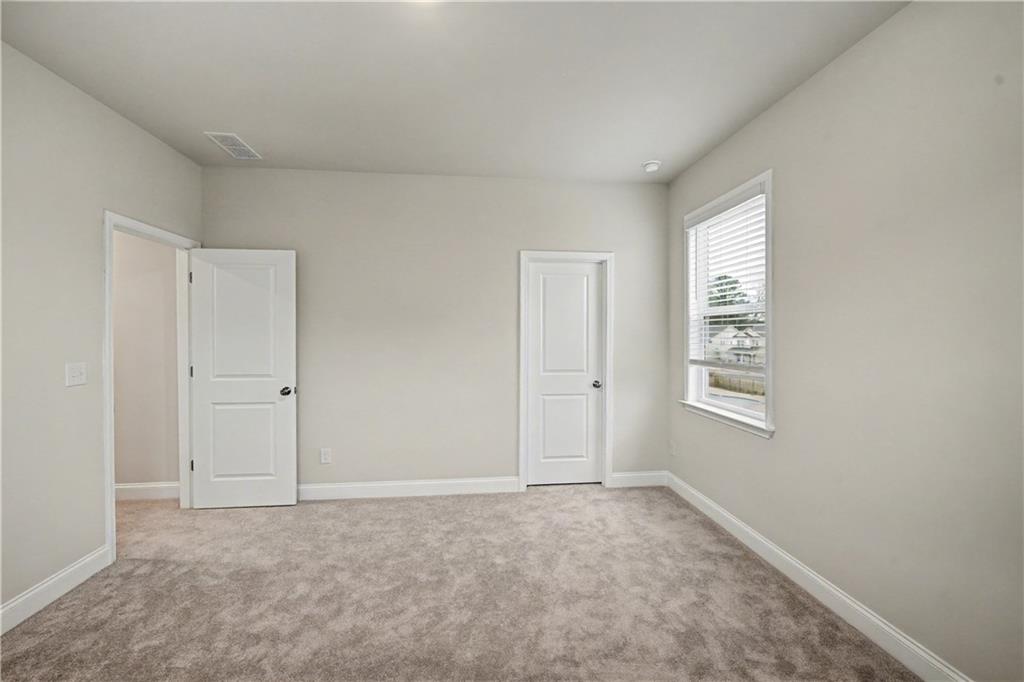 3068 Shirecrest Lane Dacula, GA 30019 - Photo 40 of 41 a view of an empty room with a window