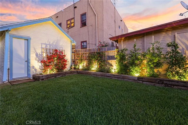 a view of a back yard of the house