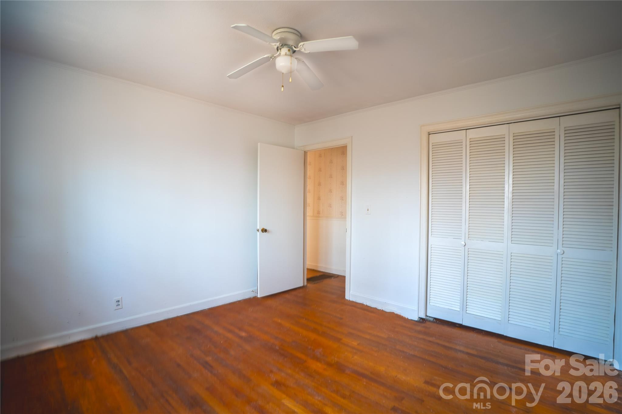 859 Stacy Hill Road Marion, NC 28752 - Photo 11 of 23 a view of an empty room with a fan