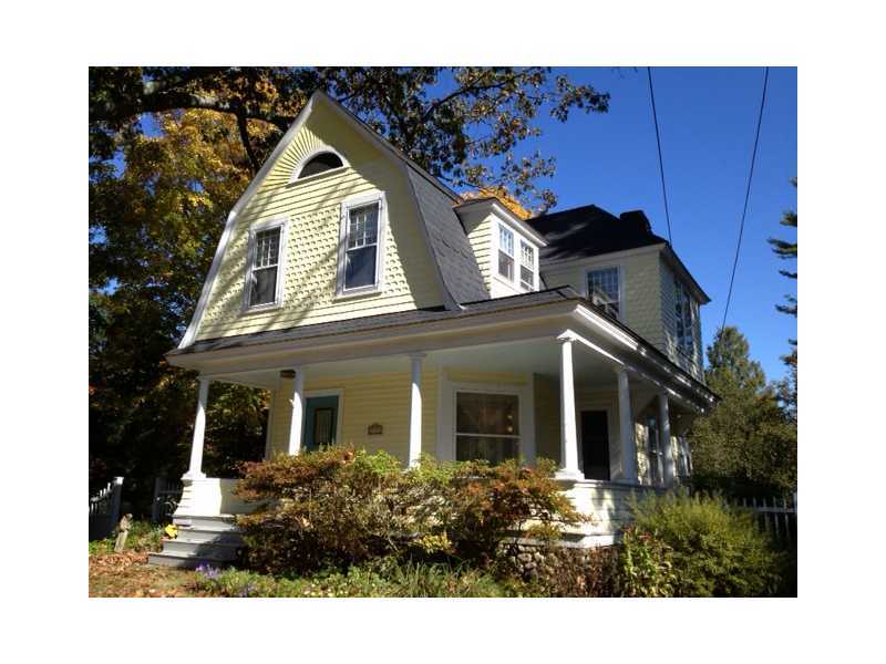 242 West Norwalk Road Norwalk, CT 06850 - Photo 2 of 13 a front view of a house with garden