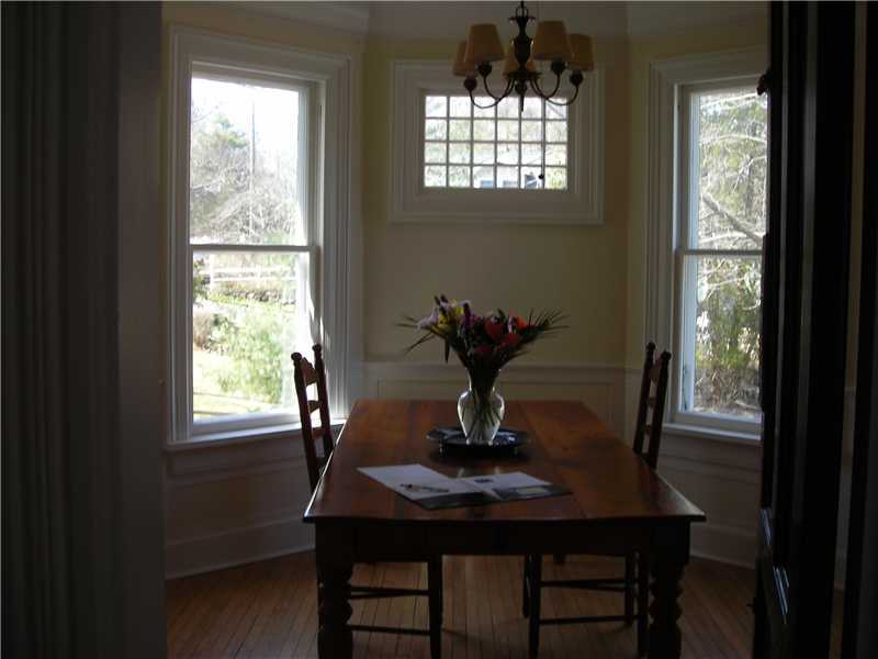 242 West Norwalk Road Norwalk, CT 06850 - Photo 8 of 13 a view of a dining room with furniture and window