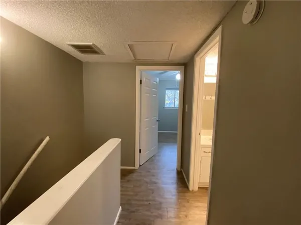 a view of balcony with furniture