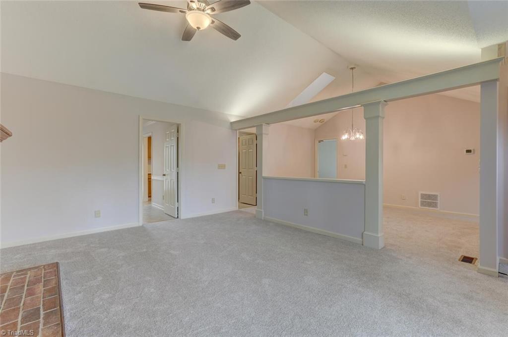 The dining area and family are open to each other.  The columns are an interesting architectural feature again adding character and charm.