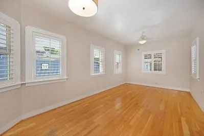 a view of an empty room with a window