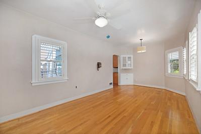 535 Myrtle Avenue Modesto, CA 95350 - Photo 15 of 42 a view of an empty room with window and wooden floor