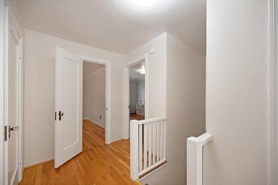 535 Myrtle Avenue Modesto, CA 95350 - Photo 25 of 42 a view of a hallway with wooden floor and entryway
