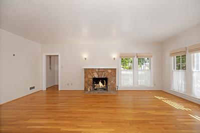 535 Myrtle Avenue Modesto, CA 95350 - Photo 7 of 42 a view of an empty room with window and fire place