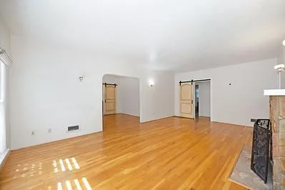 a view of an empty room with window