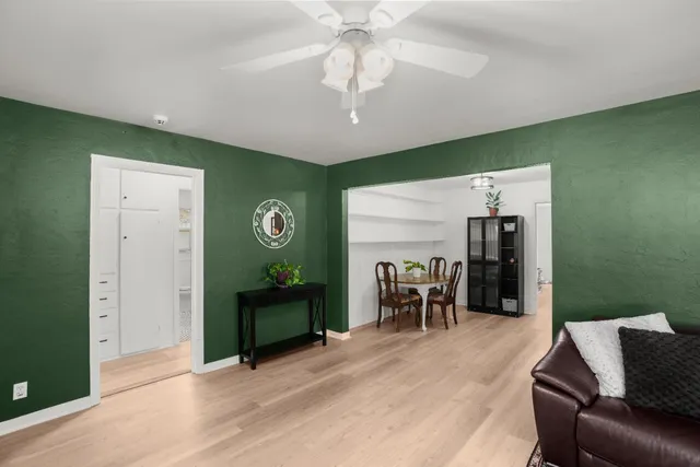 a view of a livingroom with furniture and windows