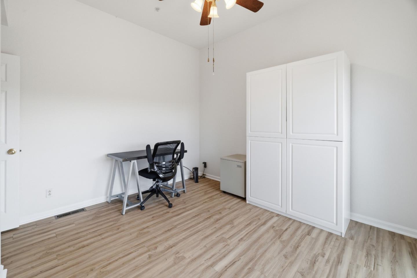 19269 Mallory Canyon Road, Unit D Salinas, CA 93907 - Photo 21 of 77 a view of a workspace with wooden floor