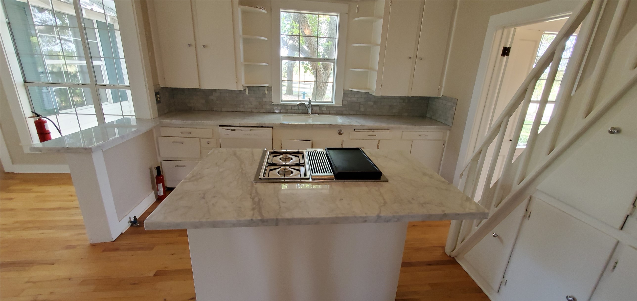 14808 Whitman Road Washington, TX 77880 - Photo 7 of 19 a kitchen with a window a sink and a stove