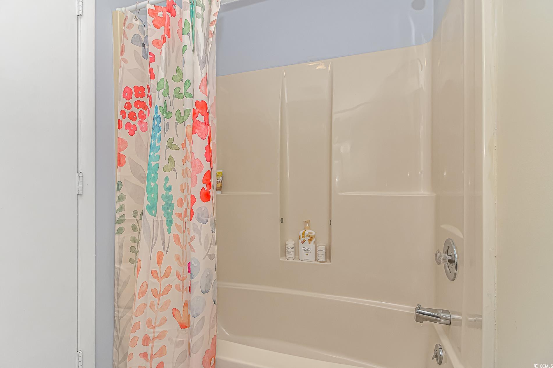 505 Tree Top Lane Myrtle Beach, SC 29588 - Photo 21 of 37 Bathroom with shower / bath combination with curta
