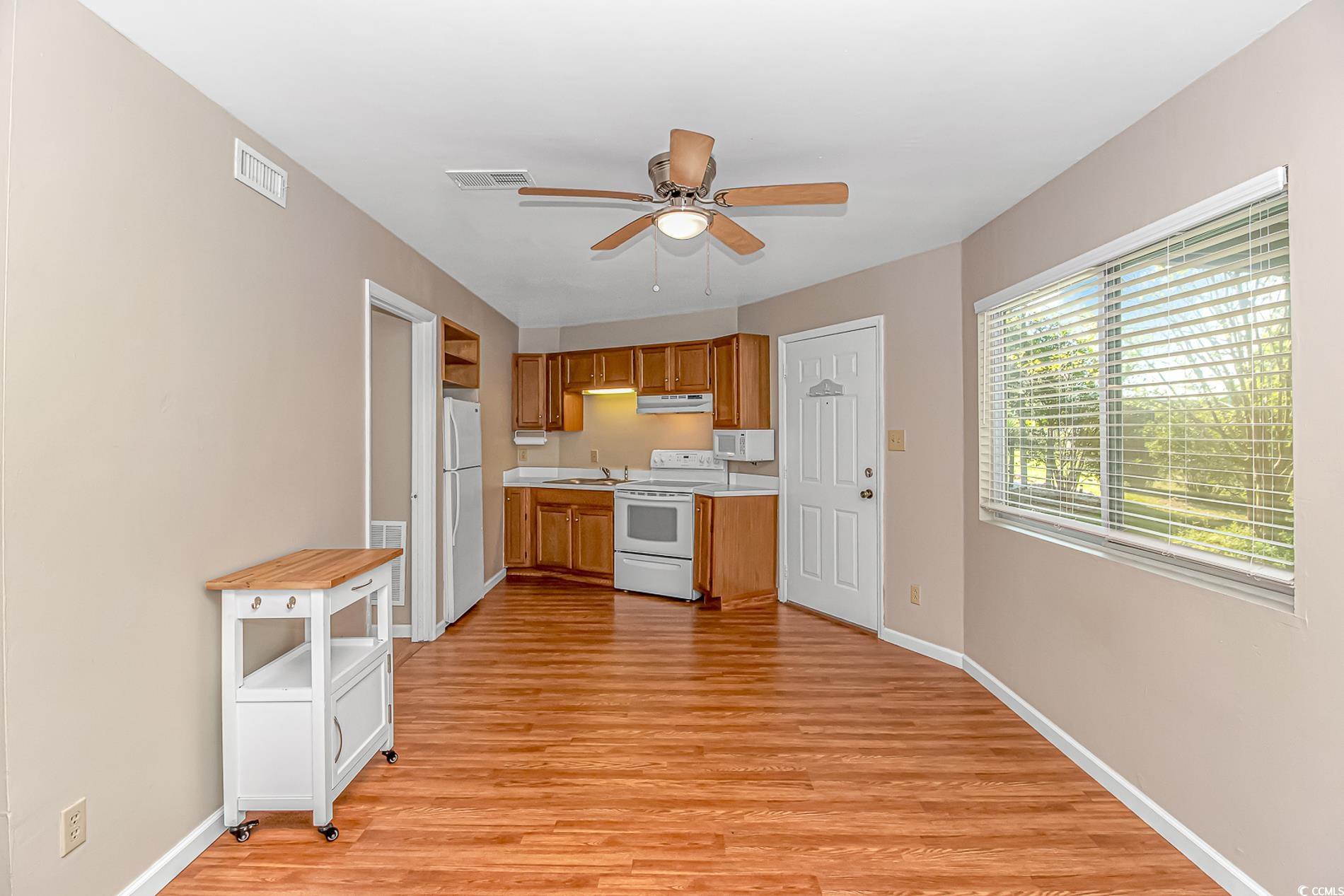505 Tree Top Lane Myrtle Beach, SC 29588 - Photo 24 of 37 Kitchen featuring visible vents, light countertops