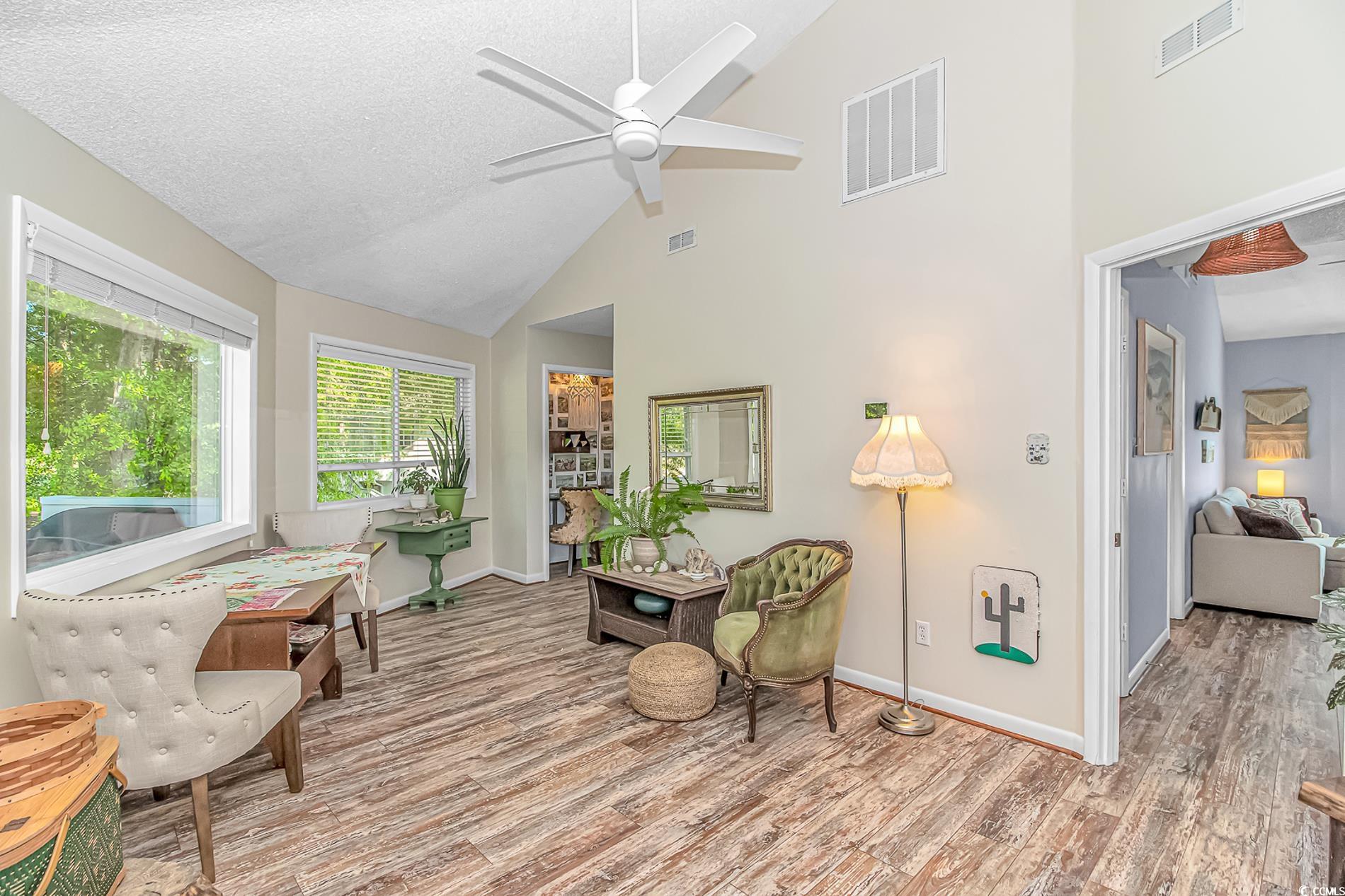 505 Tree Top Lane Myrtle Beach, SC 29588 - Photo 5 of 37 Sitting room featuring wood finished floors, high