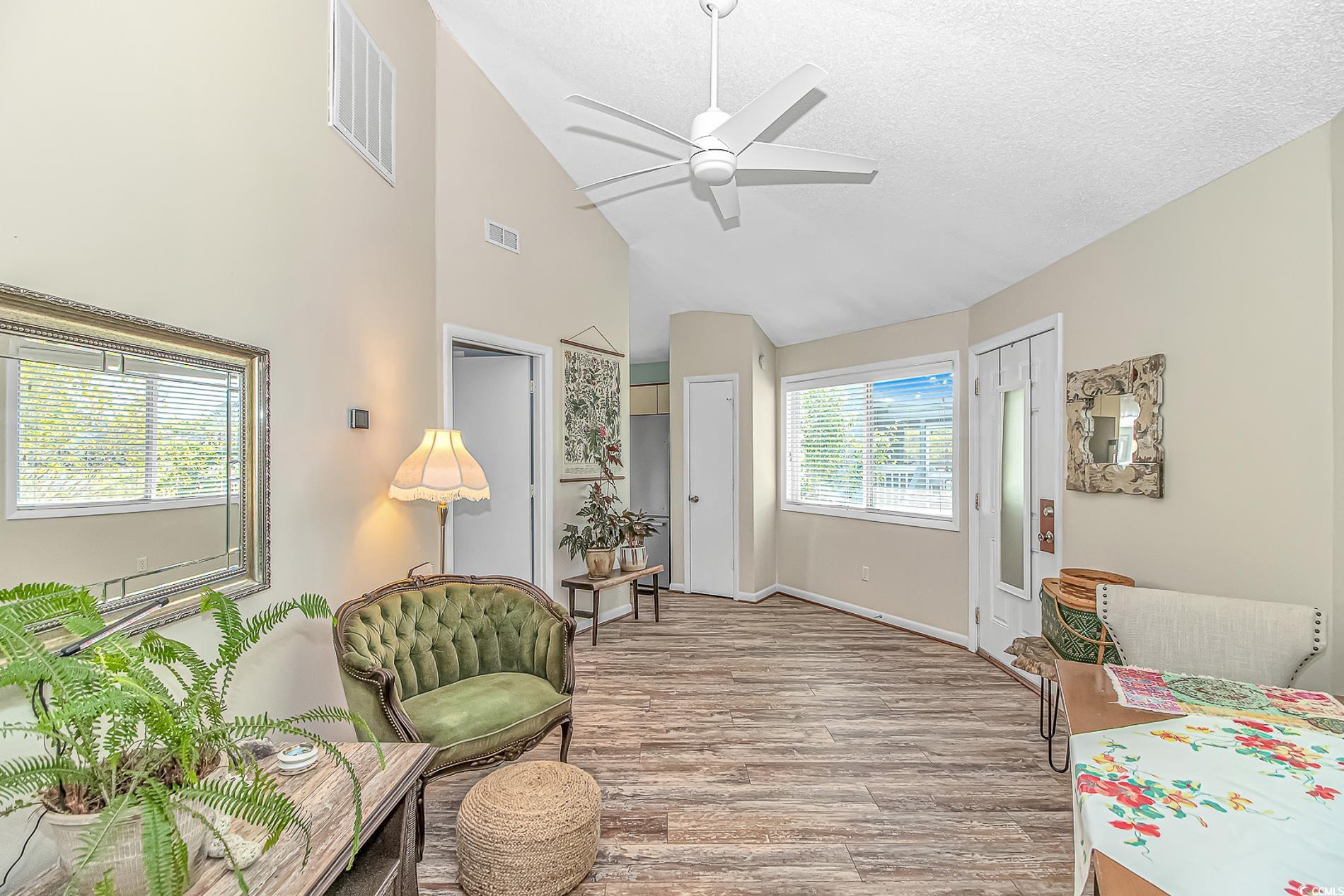 505 Tree Top Lane Myrtle Beach, SC 29588 - Photo 8 of 37 Bedroom with high vaulted ceiling, visible vents,