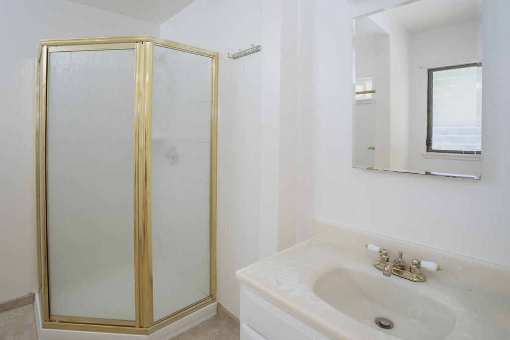 908 Vereda Del Ciervo Goleta, CA 93117 - Photo 24 of 35 a bathroom with a sink and a mirror