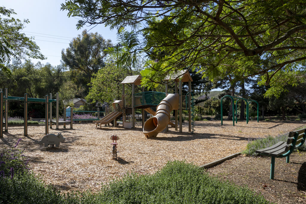 908 Vereda Del Ciervo Goleta, CA 93117 - Photo 34 of 35 a view of a park with swings and slides